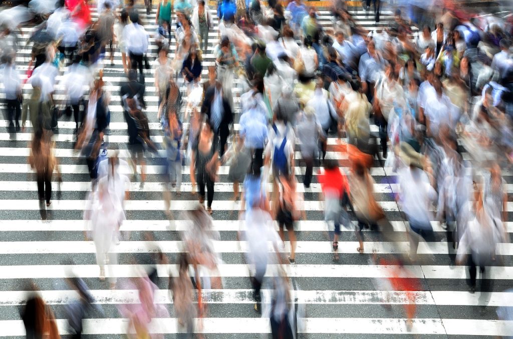 pedestrians, people, busy navigating stress overwhelm and anxiety