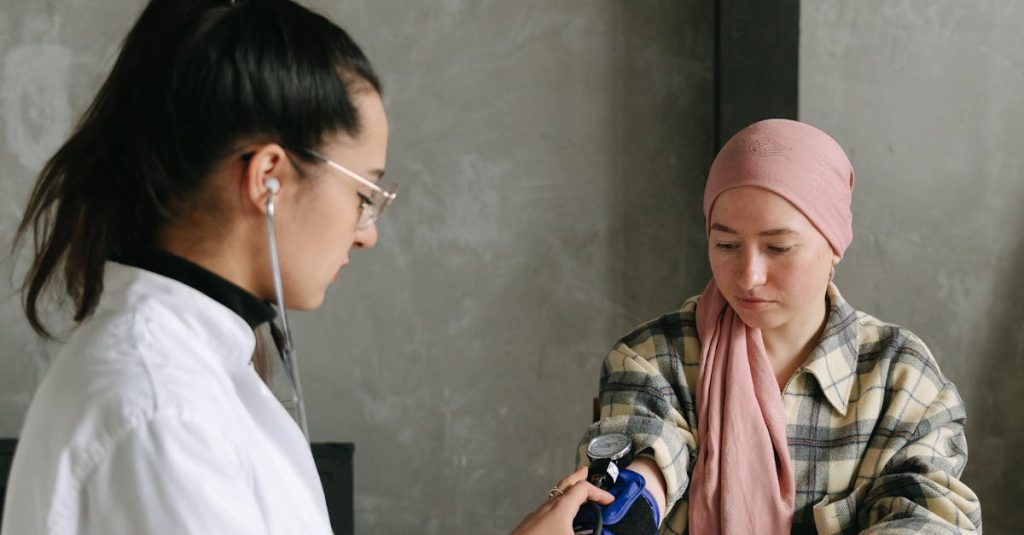 A Man Checking a Woman's Blood Pressure