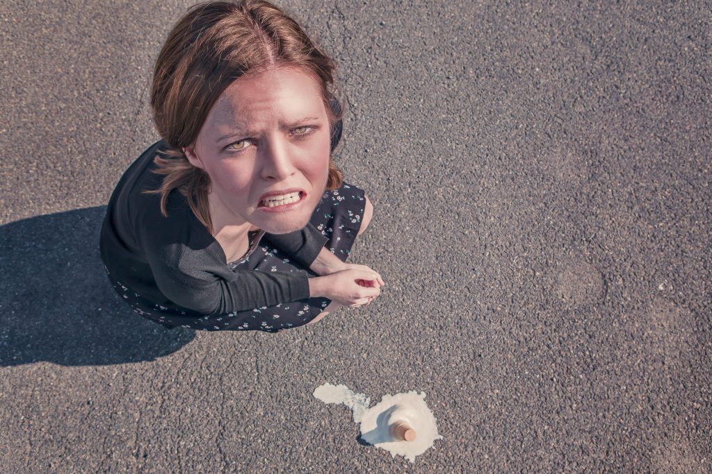 Woman Sitting Beside Ice Cream