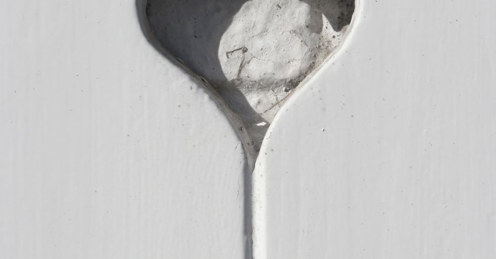 White Wooden Door With Heart Shape While Looking the Stars