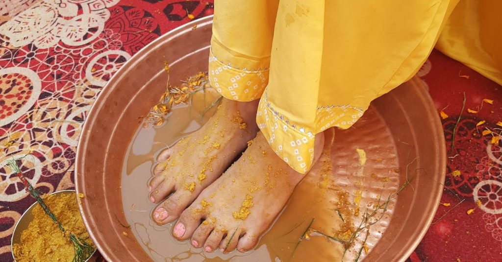 Womans Feet in a Golden Bowl pride and shame